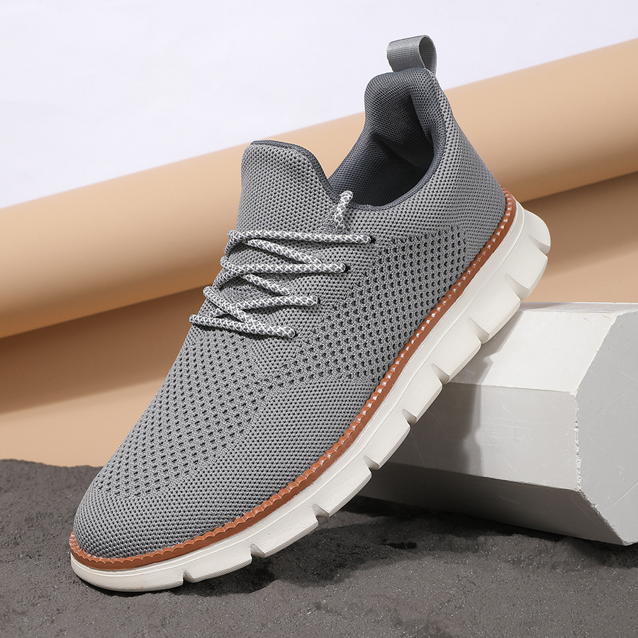 Modern men’s sneakers featuring a woven-tech upper and superior breathability
