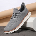 Modern men’s sneakers featuring a woven-tech upper and superior breathability