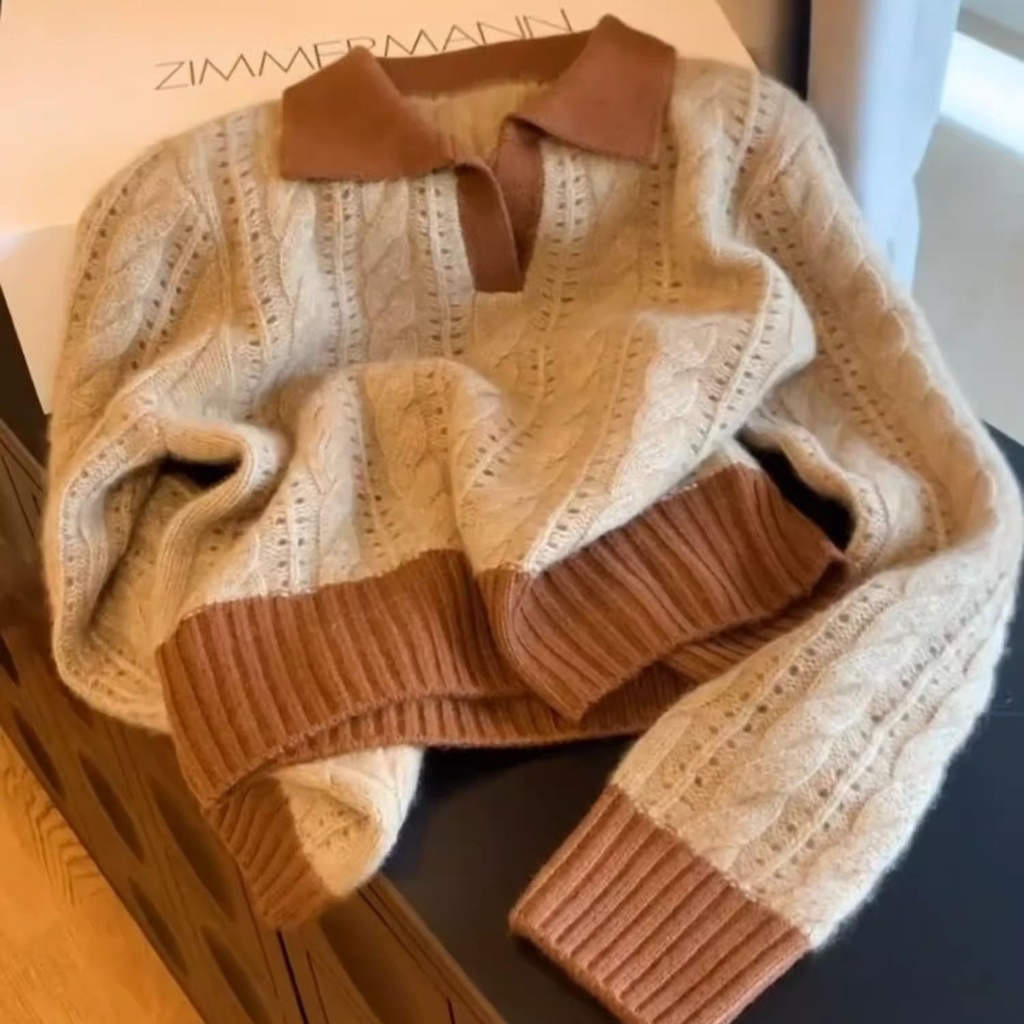 كنزة محبوكة بتصميم قديم ملتوي للنساء بملمس ناعم ومريح.