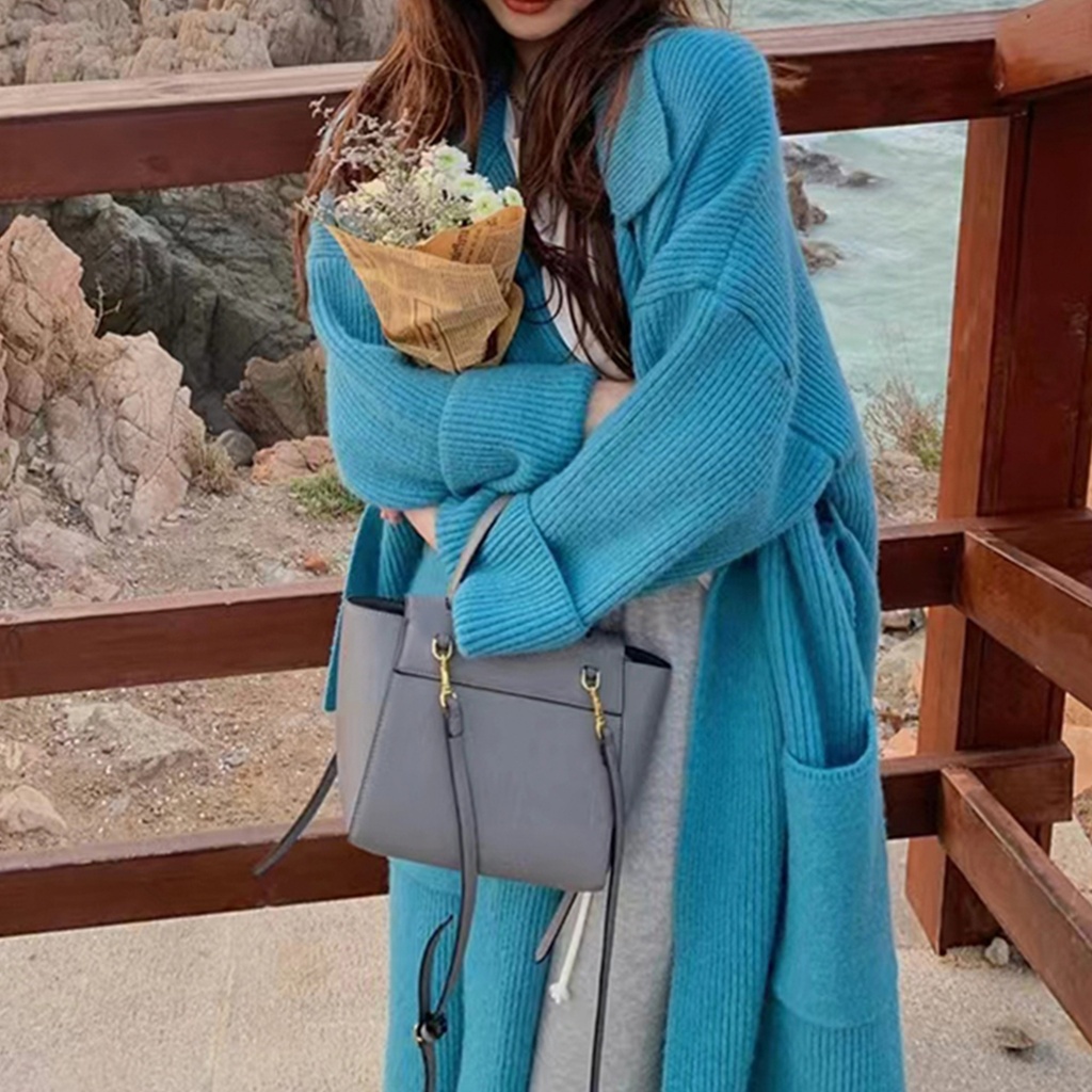 كنزة نسائية من صوف الألبكة المحبوك يدويًا بتصميم بوهيمي مريح.