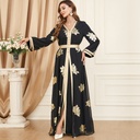 A luxurious and elegant caftan dress with a modern design, inspired by authentic Arabic heritage