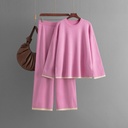 بدلة نسائية محبوكة تشمل سترة بلونين متباينين