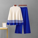 طقم نسائي مكون من بلوزة مطاطية بلونين متباينين وسروال بتصميم فضفاض