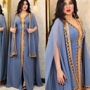 An elegant and luxurious kaftan dress with a modern and attractive Islamic-style cape