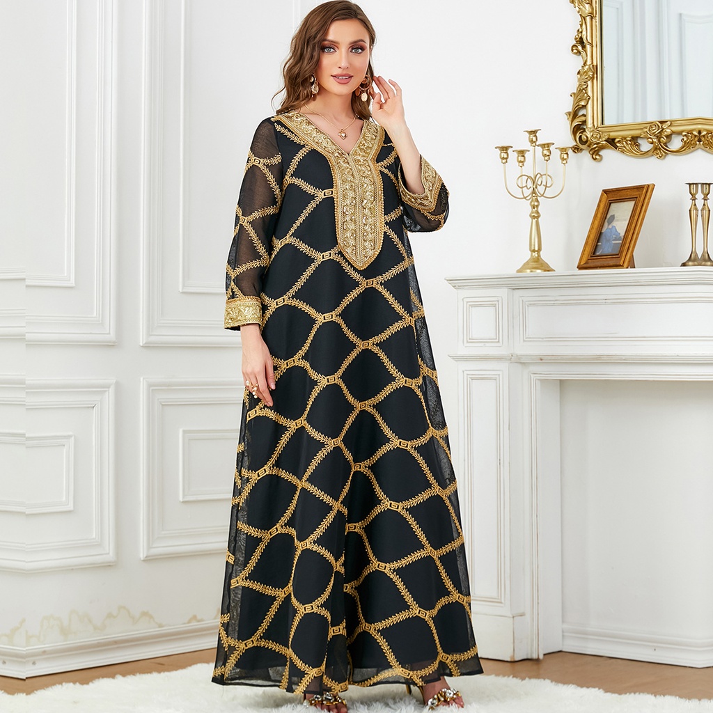 A dress with an elegant design and long sleeves.