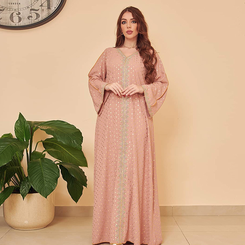 A luxurious Eastern-style loose abaya with a royal design that reflects authentic Islamic beauty