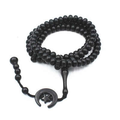 Luxury Islamic Misbaha adorned with a crescent moon and star, featuring handcrafted beads 