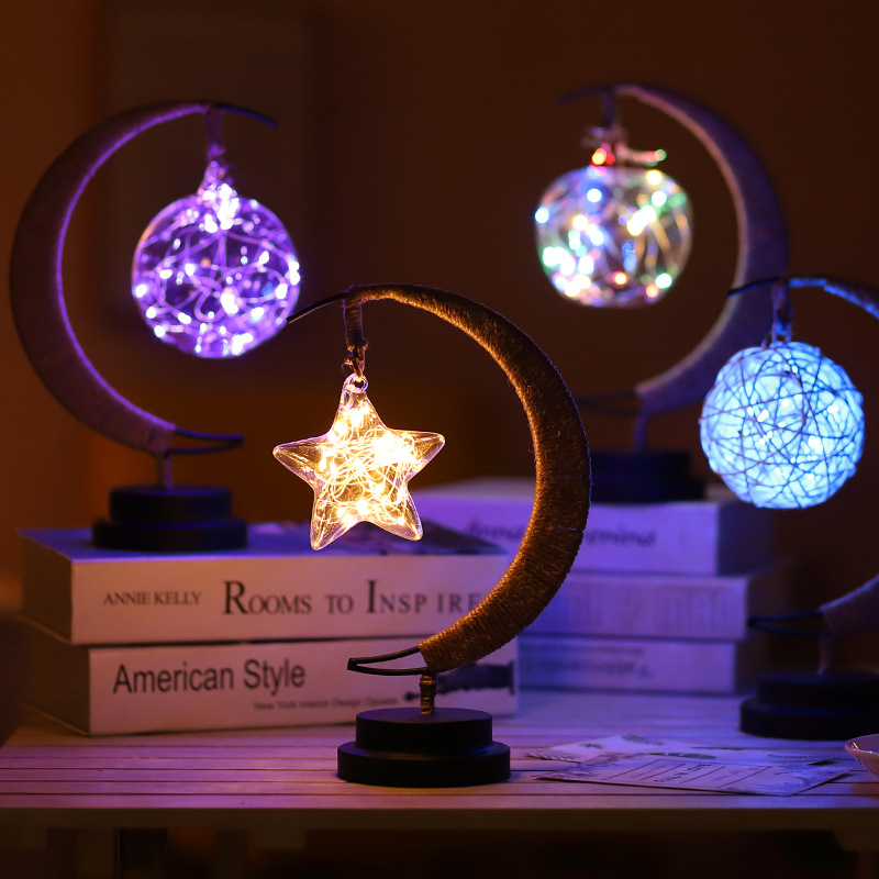 LED lamp with a moon design, featuring a decorative iron piece adorned with copper wire shaped like a star, and powered by a USB battery