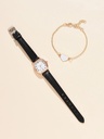 A vintage-style women's watch with a square dial and a leather strap, adding an elegant artistic touch