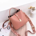 Choose this unique women's bag that skillfully blends the allure of elegance with practicality 