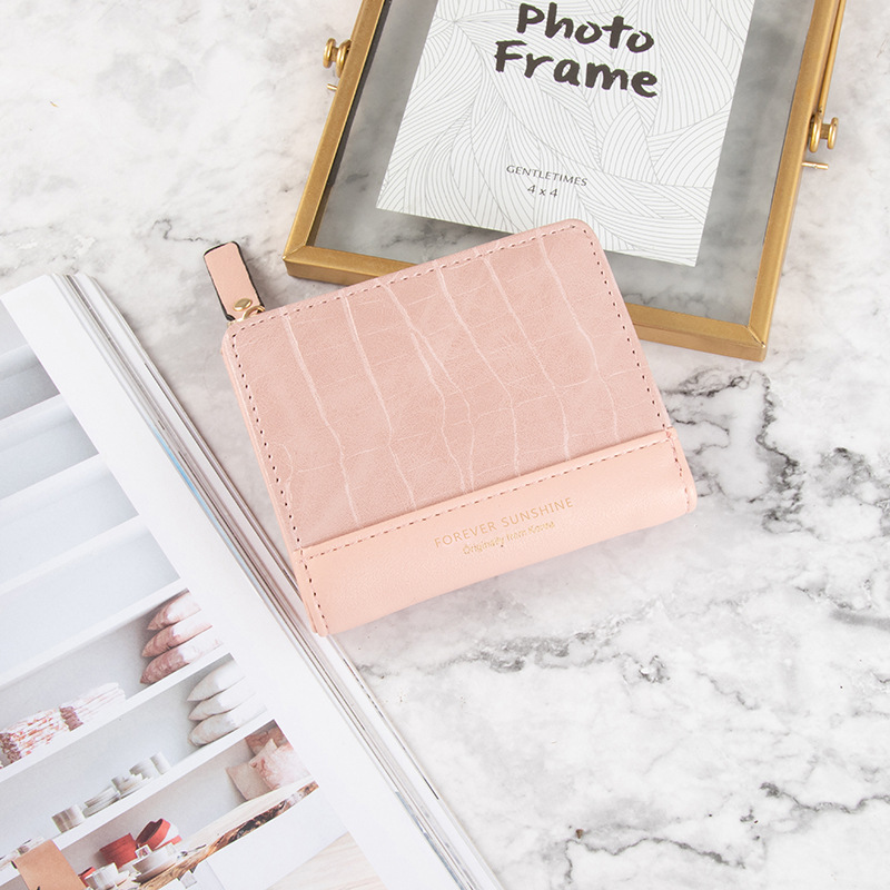 An elegant women's wallet with a modern design that combines sophistication and functionality