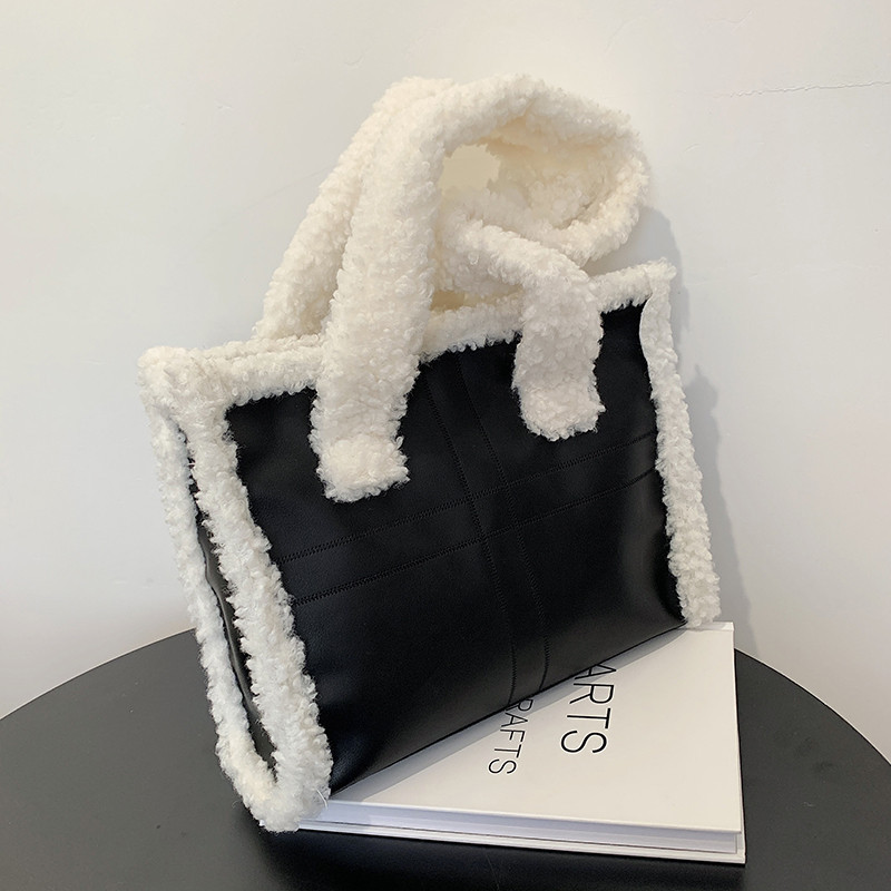 Elegant and cozy faux fur crossbody bag with a casual Western-inspired design