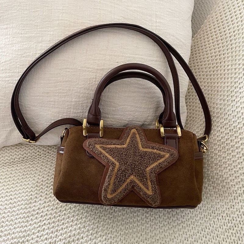 Elegant Handbags with a Vintage Design and Luxurious Suede Texture