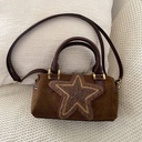 Elegant Handbags with a Vintage Design and Luxurious Suede Texture