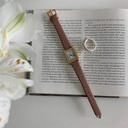 Elegant and Modern Women's Watch with Roman Numerals and a Leather Strap