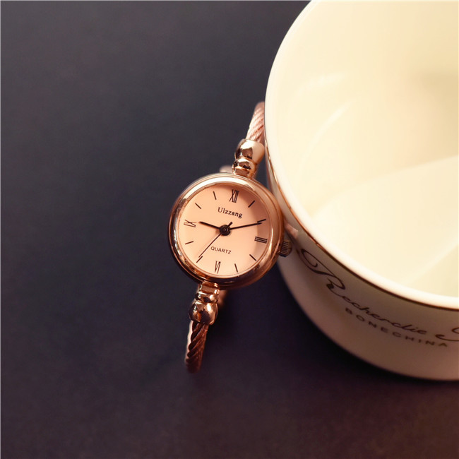 Women's Watch with an Elegant Design and Iron Chain Bracelet