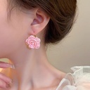 Elegant and attractive earrings made of resin, featuring a beautiful flower design, perfect for adding a feminine and stylish touch to your look