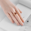 An elegant and stylish gold-plated ring designed to be adjustable, making it a perfect accessory for any occasion
