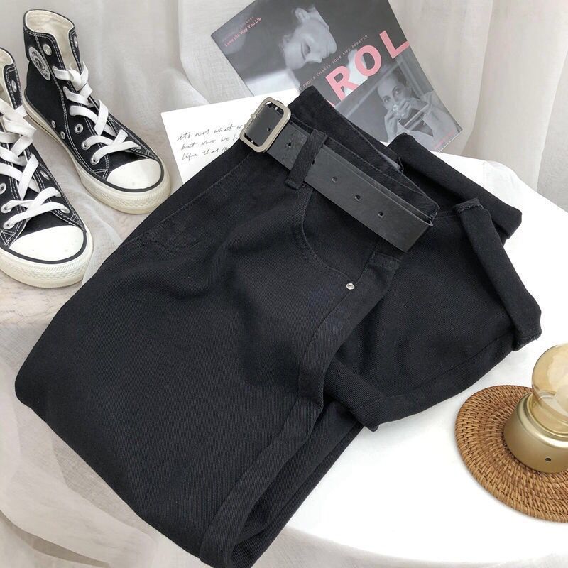 Women's high-waisted jeans with a wide, straight-leg cut and a relaxed fit