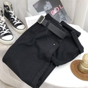 Women's high-waisted jeans with a wide, straight-leg cut and a relaxed fit
