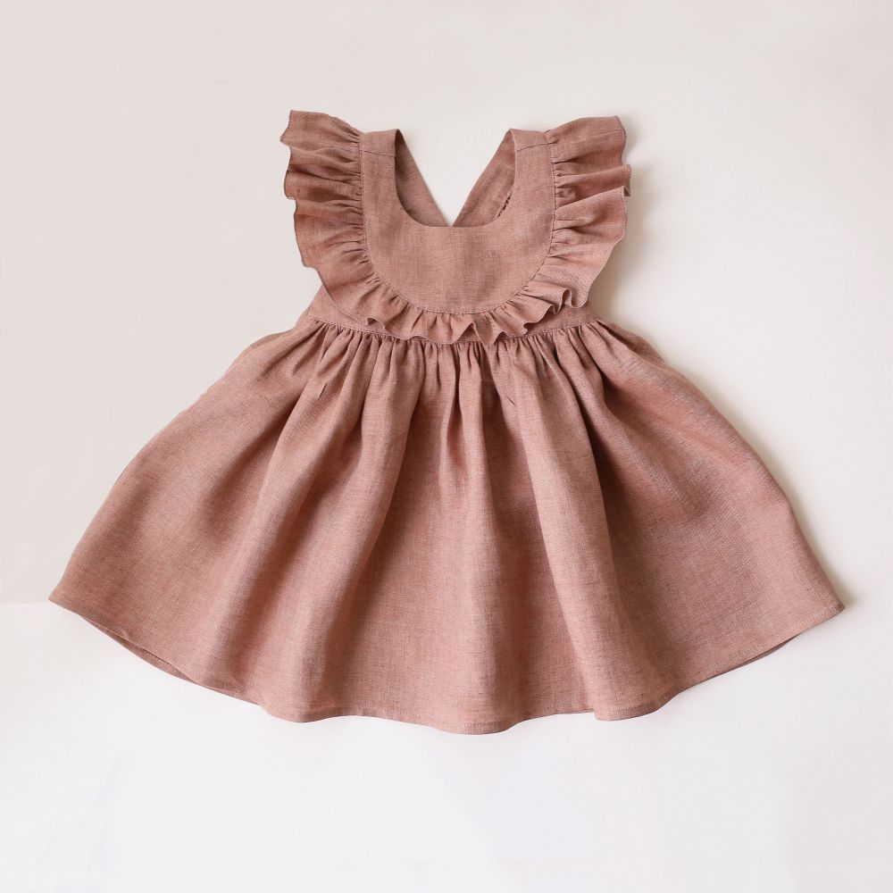 Summer dress for baby girls made of soft cotton, featuring a comfortable and elegant design perfect for warm summer days