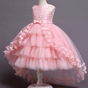 Girls' dress with a unique design, adorned with lace and layered pettiskirt, offering a soft feminine touch and a modern, elegant look