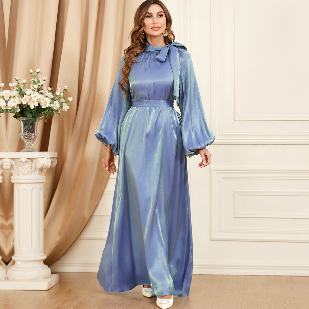 Elegant long-sleeve dress in a solid color, featuring a lace-up front and a design inspired by European and American styles
