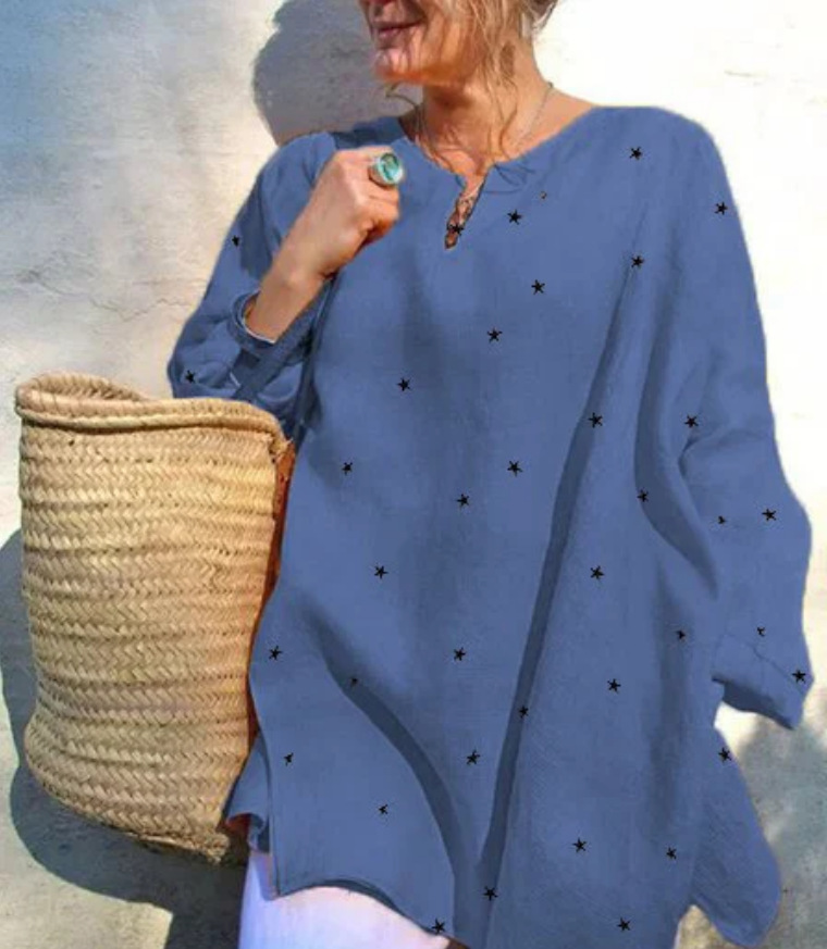V-neck top with long sleeves, adorned with a stylish star print that adds a modern, eye-catching touch