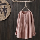 Elegant pullover blouse made from a cotton and linen blend, featuring a simple design with a round neckline for a comfortable and modern everyday look