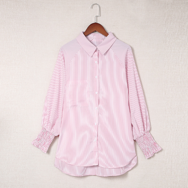 Loose-fitting women's shirt with a striped design, featuring a stand collar, smocked details, and long bubble sleeves for a stylish and comfortable look
