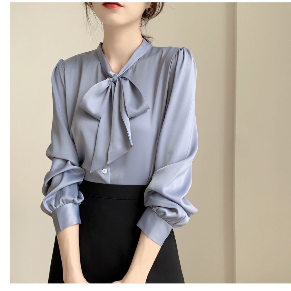 Elegant women's shirt with a collar and front bow tie in a solid color and long sleeves – perfect for both formal and casual looks
