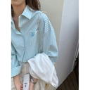 Women's French-Style Shirt with Unique Striped Design and Elegant Aesthetic