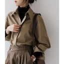 Elegant loose-fitting women's shirt with long sleeves and a solid color, suitable for all occasions
