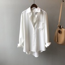 Elegant women's shirt with long sleeves and a classic lapel collar design