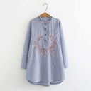 Loose striped women's shirt with elegant embroidery and a stand-up collar for a refined casual look