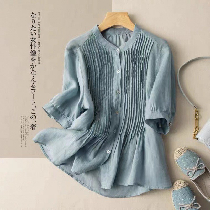 Elegant women's blouse made of soft, high-quality linen, offering a classic look
