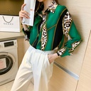 Women's chiffon shirt with leopard print and contrast accents, featuring a stylish design and long sleeves