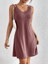 Elegant summer women's dress with a V-neckline, lace details, and striped accents