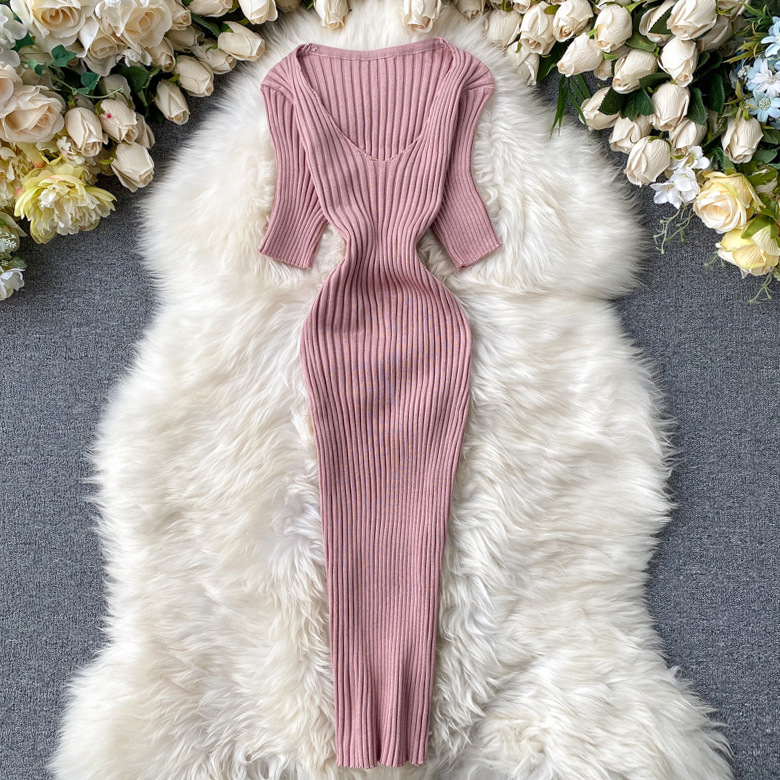 Knitted bodycon dress in solid color with a V-neckline and ribbed stripe texture for a sleek, modern look