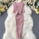 Knitted bodycon dress in solid color with a V-neckline and ribbed stripe texture for a sleek, modern look