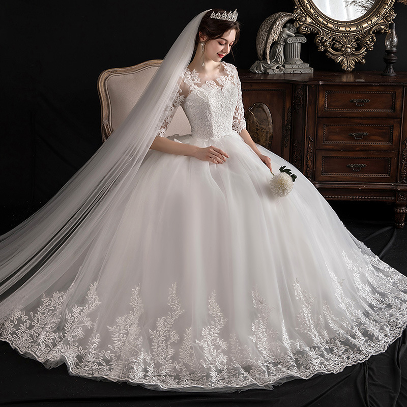 Elegant one-shoulder dress with slim lace sleeves and a dreamy feminine design