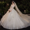 A luxurious wedding dress with an elegant French design, perfect for those seeking a distinctive, royal look