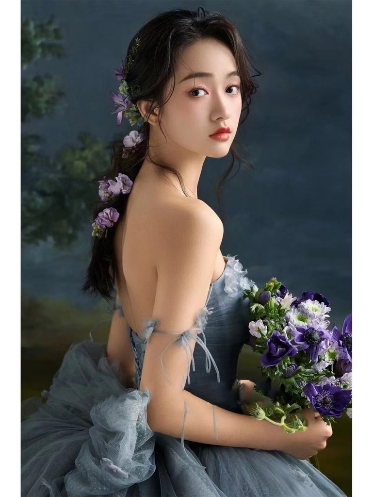 An elegant dress adorned with shimmering patterns and a luxurious glow — perfect for a look that radiates elegance and distinction