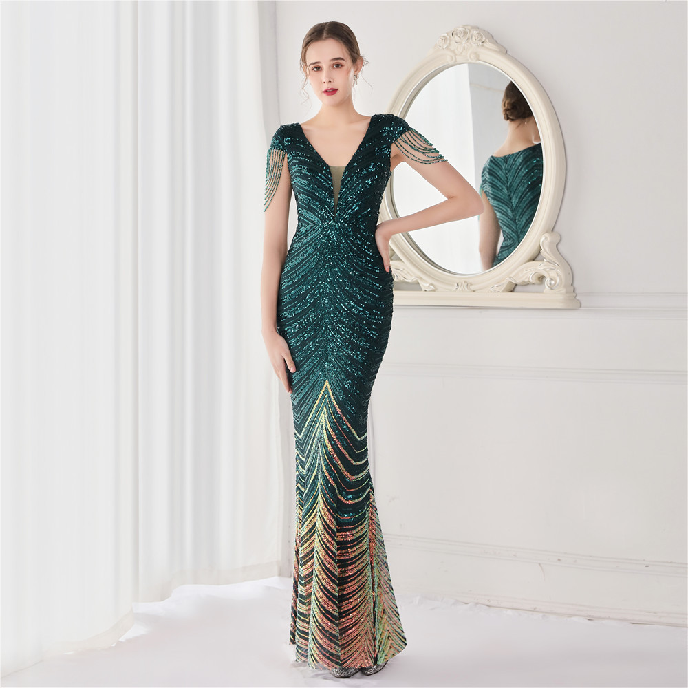 An elegant long evening gown adorned with dazzling floral sequin embellishments