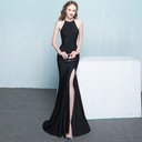 An enchanting mermaid-cut dress with an elegant halter neckline that beautifully exposes the shoulders