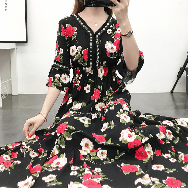 Women's floral-print dress with mid-length sleeves for an elegant summer look