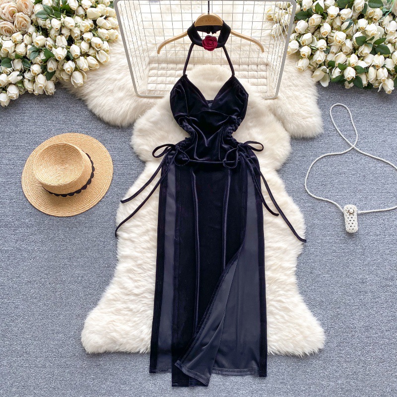 A satin dress featuring a halter neck that combines luxury and comfort in one