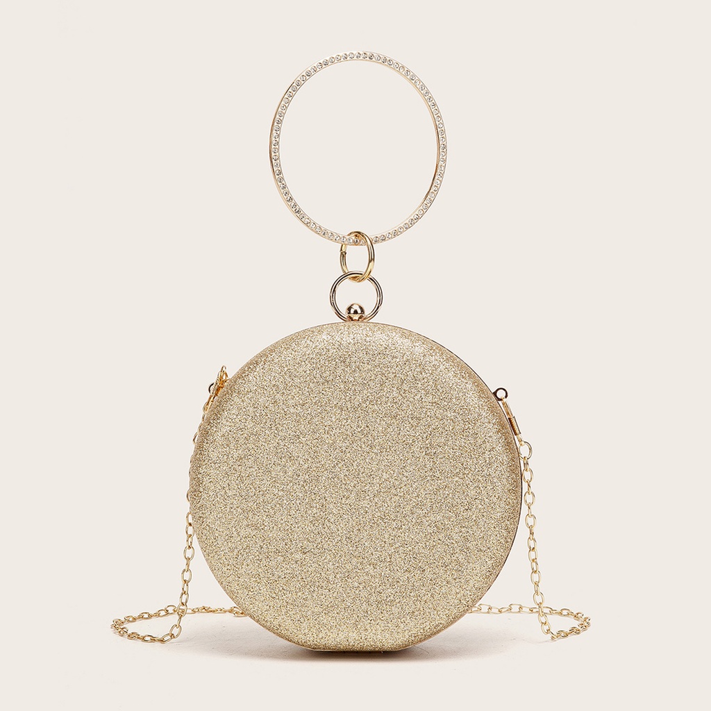 Diamond-encrusted round evening bag with an elegant chain