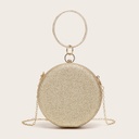 Diamond-encrusted round evening bag with an elegant chain