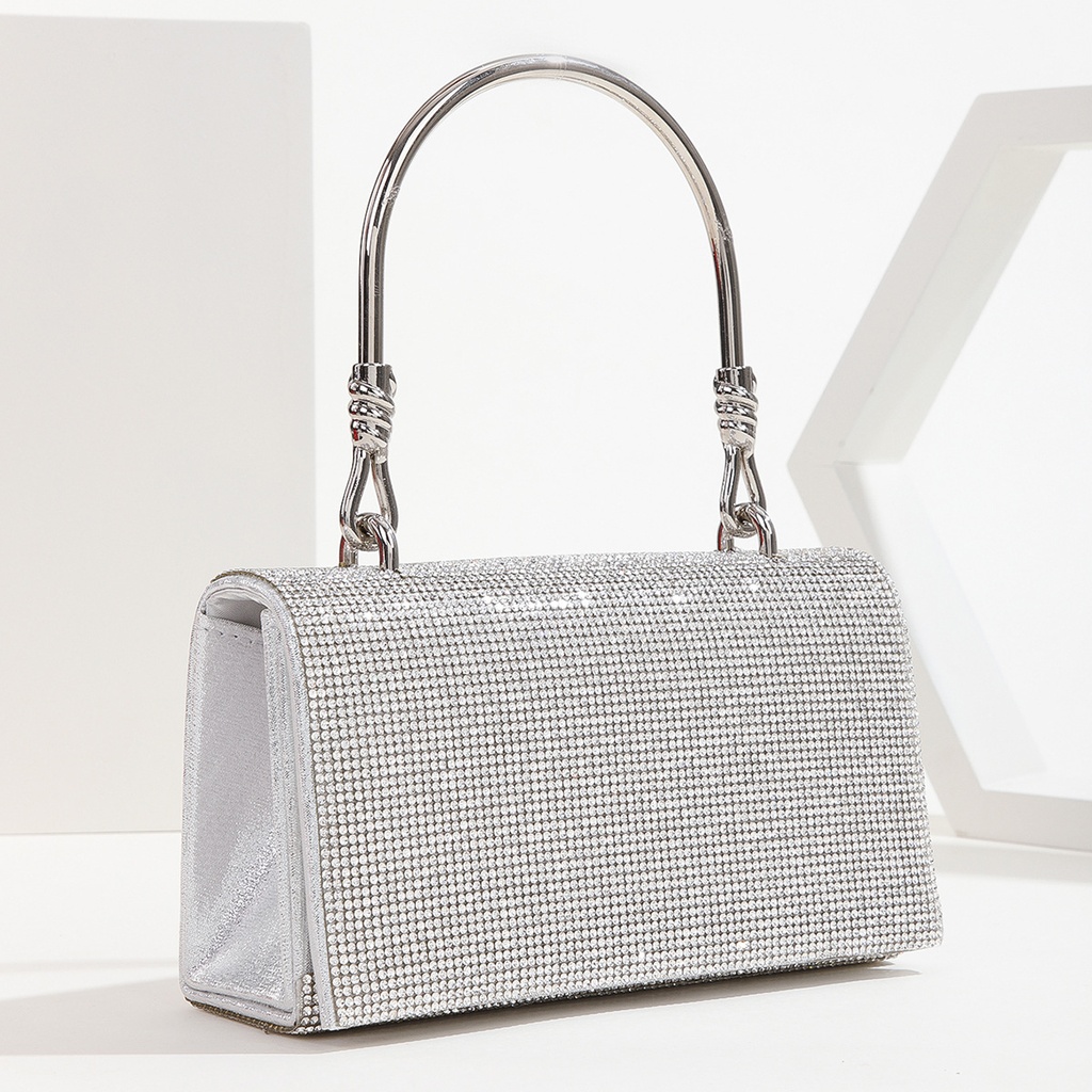 Elegant wrist evening bag adorned with rhinestones, perfect for parties
